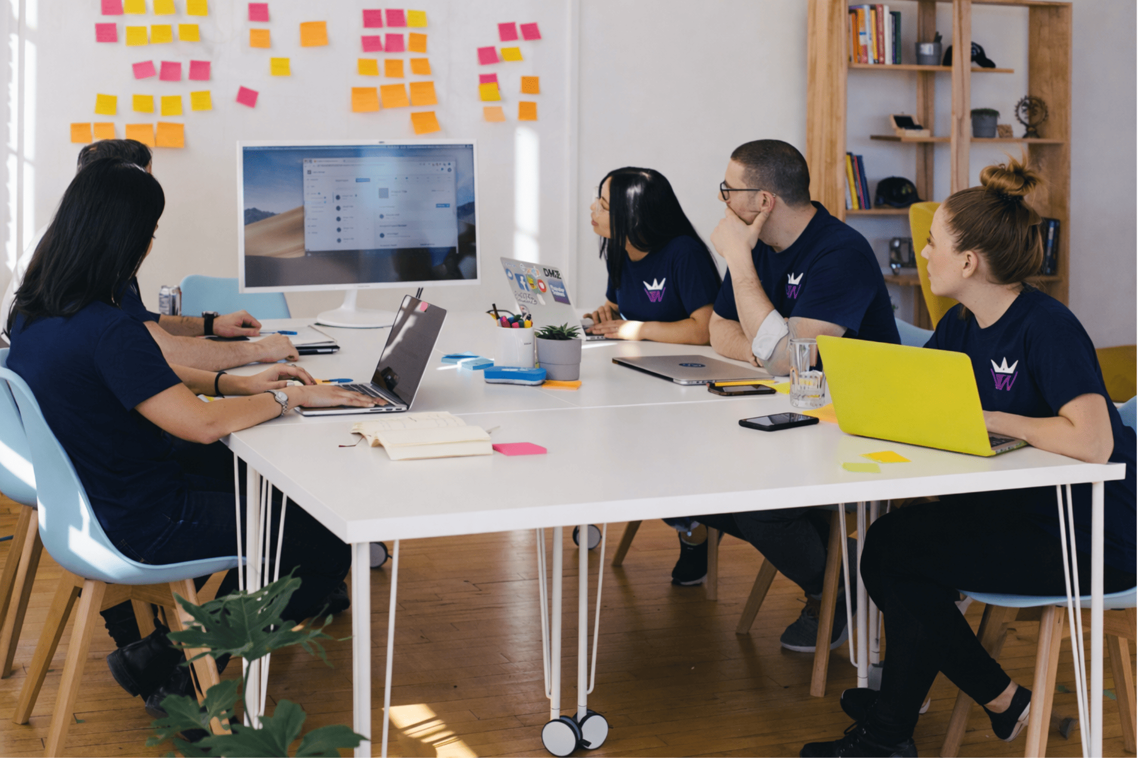 MyWebGlory team in a strategy meeting, planning an event marketing campaign